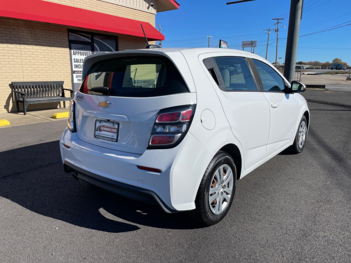 2017 White Chevrolet Sonic (1G1JG6SH2H4) with an 4-Cyl, 1.8 Liter engine, Automatic, 6-Spd transmission, located at 8008 Warden Rd, Sherwood, AR, 72120, (501) 801-6100, 34.830078, -92.186684 - Photo#7